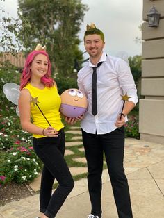 a man and woman are dressed up as pikachu and tinkerbells