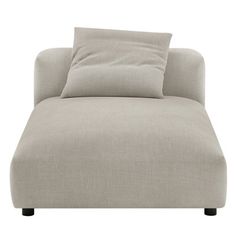 a gray couch with two pillows on it