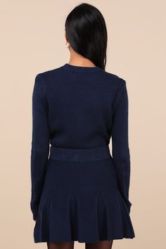 You can talk your way into anything with a smile and the Lulus Most Adorable Vibes Navy Blue Knit Pleated High-Rise Mini Skirt! Soft sweater knit shapes this too-cute skirt with a high-rise fit and an elastic waistband. The A-line silhouette features box pleats and a flirty mini hem. Contrasting ribbed knit accents the waistband. Pair with the matching cardigan for a complete look! Fit: This garment fits true to size. Length: Mid-thigh. Size medium measures 16" from waist to hem. Waist: Fitted - stretchy fabric allows custom fit. Hip: Fitted - stretchy fabric allows room for hips. Fabric: Fabric is very stretchy. Unlined. 100% Acrylic. Hand Wash Cold. Do Not Bleach. Line Dry. Iron Low Heat. Imported. Lulus | Most Adorable Vibes Navy Blue Knit Pleated High-Rise Mini Skirt | Size Small. Mini Skirt Pleated, Knit Mini Skirt, Button Front Cardigan, Soft Sweater, Cardigan Top, Box Pleats, Cute Skirts, Softest Sweater, Sweater Knit