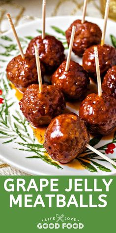 grape jelly meatballs on a plate with toothpicks in the middle and text overlay that reads grape jelly meatballs