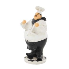 a figurine of a chef on a checkered floor