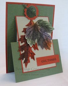 a card with leaves on it and the words give thanks