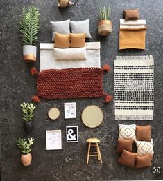 an overhead view of a living room with pillows, rugs and other items on the floor