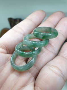 Giftable items : Beautiful, speckled Icy Green Jade rings in size 54 (US 7). Width 5.5 mm. Fei Cui, Type A natural Jadeite (non-bleached, non-dyed, non-treated materials). Ideal for stacking. Listed price is for 1 piece ring only. Jade Stone Ring, Luxury Handmade Chrysoprase Ring, Jade Ring, Jade Jewelry, Jade Stone, Jade Green, Stone Rings, Jade, Band Rings