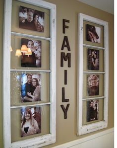 family pictures are hung on the wall behind windows