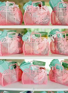 pink and green baskets are on shelves with tags in the middle, one is filled with tea bags