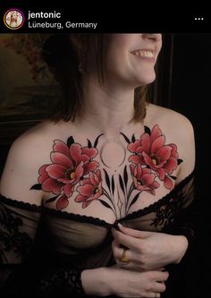 a woman with flowers painted on her chest