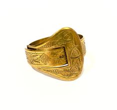 "Antique engraved wide brass buckle bracelet is truly impressive. Gorgeous mid to late 1800's Victorian cuff has intricately carved multi patterns and oversized belt buckle hinged clasp that is easy to close while staying securely fastened when wearing. A conversation piece for sure, solid and substantial high quality workmanship and design statement making piece of jewelry, I've never seen another one like it! Buckle jewelry was popularized by Queen Victoria, that carried over into the Edwardian Era and today remains a timeless symbol of romance. The buckle was a common motif in Victorian jewelry as it symbolized eternity. The idea of one end being threaded into the other, creates a never ending circle. Condition : Very good condition with normal age wear. Measurements:  3/4\"  x   7\" , Oversized Belt, Solid Gold Bangle, Buckle Jewelry, Lucite Bracelets, Brass Belt, Brass Belt Buckles, Brass Cuff, Buckle Bracelet, Dior Jewelry