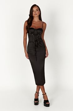 It’s serving ‘screen goddess’. This structured corset midi dress is made from our soft and luxurious satin fabric that embraces every curve. It features a smooth lining and sweetheart bustier neckline for support, with adjustable straps, a drawstring waistline and centre-back split for easy wear. Romantic and cinematic, pair with your favourite heels for an iconic look. FEATURES: Adjustable shoulder straps Corset style bustier Centre front tie up detailing with gold D-rings Side invisible zip cl Black Ruched Satin Corset Dress, Party Corset With Spaghetti Straps And Ruched Detail, Spaghetti Strap Corset Back Dress For Club, Spaghetti Straps Corset Back Dress For Club, Black Corset With Ruched Bodice For Night Out, Elegant Black Corset Dress With Lace-up Back, Elegant Corset With Adjustable Straps For Party, Elegant Party Corset With Adjustable Straps, Satin Corset Dress With Ruched Detail For Night Out