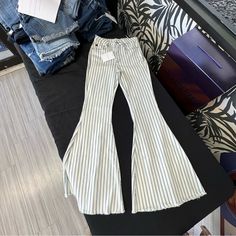 White Jeans With Blue Stripes And Flare Leg / Bell Bottoms White Cotton Bottoms For Spring, Chic Striped Bottoms For Spring, Striped Long Pants For Spring, White Cargo Pants For Spring, White Non-stretch Pants For Spring, White Stretch Jeans For Summer, Summer Cotton Flare Bottoms, Summer Flare Cotton Bottoms, White Straight-leg Bottoms For Spring