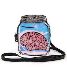 Make a statement with this Brain in a Jar Crossbody Bag! Featuring an eye-catching novelty design in bright colors, this purse is sure to draw attention. Show off your quirky style with this conversation-starting conversation piece that you won't find anywhere else. (And yes, it's real!)   Quality vinyl material and un Brain In A Jar, Novelty Purses, Zombie Walk, Novelty Bags, Drop Top, In A Jar, Small Crossbody Bag, Small Crossbody, Cute Bags