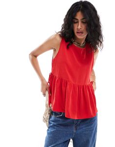 ASOS DESIGN tie side swing top in red | ASOS Red Casual Tie Back Top, Sleeveless Tie Back Top For Day Out, Trendy Sleeveless Top With Tie Back, Trendy Sleeveless Tie Back Tops, Chic Red Tie-back Top, Chic Red Tie Back Top, Casual Sleeveless Blouse With Tie Back, Red Sleeveless Top For Day Out, Red Sleeveless Blouse For Day Out