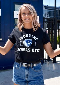 Sporting Kansas City Black Building Strategy Short Sleeve T Shirt - 17257268 Black T-shirt With Football Season Text Print, Black T-shirt With Text Print For Football Season, Black T-shirt With Team Logo, School Spirit Style, Black T-shirt With Team Logo For School Spirit, Black School Spirit T-shirt With Screen Print, Black Crew Neck T-shirt For School Spirit, Black Fandom T-shirt With Letter Print, Black Crew Neck T-shirt With School Spirit, Black Casual T-shirt For Football Season