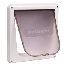 the petsafe cat door is white and has an open window for it to see inside