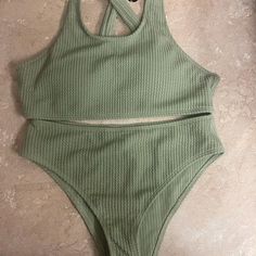 Ribbed Material. Never Worn. Olive Green. Fitted Green Ribbed Swimwear, Ribbed One-piece Swimwear For The Beach, Sleeveless Ribbed Summer Swimwear, Green Ribbed Swimwear For The Beach, Green Ribbed Swimwear For Beach, Ribbed Swimwear For Summer, Summer Ribbed Swimwear For Spring, Summer Sleeveless Ribbed Swimwear, Ribbed Sleeveless Swimwear For Beach