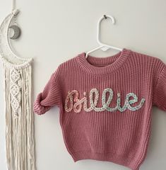 100% cotton oversized chunky knitted sweaters! perfect for birth announcements, newborn/family photos, baby shower gifts, birthday gifts! Each name is hand embroidered and made to order, therefore no two will look the exact same. *Please note that 0-3 is not available in Cream, Navy or Spruce(darker green available In that size if interested)* Yarn: extra chunky- best for 5 letters or less on smaller sweaters. If you're unsure about yarn type and length of name reach out to me for recommendation Cute Cotton Chunky Knit Sweater, Personalized Pink Crew Neck Sweater, Personalized Pink Sweater For Winter, Personalized Cute Crew Neck Sweater, Cute Cotton Crochet Sweater, Cute Crochet Cotton Sweater, Chunky Knitted Sweaters, Baby Name Sweater, Name Sweater