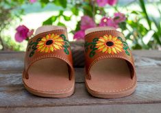 Womens embroidered leather authentic mexican huarache wide slip on sunflower sandal Casual Summer Clogs With Stitched Sole, Traditional Open Toe Spring Clogs, Comfortable Slip-on Huarache Sandals For Summer, Traditional Open Toe Clogs For Spring, Traditional Open Toe Clogs For Summer, Summer Slip-on Clogs With Stitched Sole, Traditional Huarache Sandals With Rubber Sole For Summer, Traditional Slip-on Summer Clogs, Yellow Huarache Sandals With Round Toe For Summer