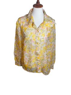 Vintage 60s Yellow Floral Sheer Button Down Shirt with Collar Size: Look to Measurements Condition: Great. No Noticeable Flaws. This is a vintage item that has been previously loved. You are purchasing this item with the knowledge of it being a used item that may come with flaws. I have done my best to note all major found flaws. Selling as is. Measurements: Length- 29" Sleeve Length- 31.5" Bust- 50" Spring Retro Button-up Blouse, Retro Spring Blouse With Button Closure, Retro Spring Blouse With Buttons, Retro Button-up Blouse For Spring, Vintage Yellow Blouse With Buttons, Vintage Summer Blouse With Buttons, Summer Vintage Buttoned Blouse, Vintage Collared Blouse For Summer, Retro Collared Blouse For Vintage Fashion