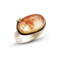 Gold, Silver & Stone Ring - This ring features a stunning, rose-cut rutilated quartz wrapped in a 22k gold bezel. Unusual, coppery rutile imparts a magical quality to the stone. Accented with two sparkling diamonds.<br><br>Hammered sterling band. Available in whole and half sizes 4-10. Rutilated Quartz Jewelry, Backyard Elopement, Gem Stone Jewelry, Rutilated Quartz Ring, Artisan Rings, Jewelry Showcases, Artful Home, Quartz Jewelry, Ancient Jewelry