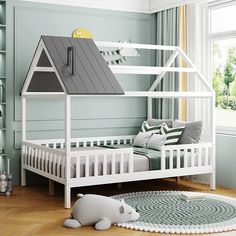 a child's bed with a house on the top and bottom bunk above it