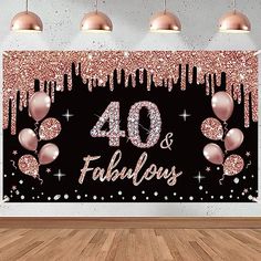 a black and pink wall with balloons on it