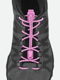 the shoe laces are attached to an athletic shoe