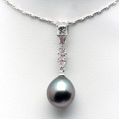 This product will be shipped by express and free shipping. Type of metal: Genuine 18K white gold Type of stone: Natural Diamond 0.57ct Colorless×1, Pink×3 Length: 30mm Bail inside diameter:2mm×6mm Weight: 2.4g Type of pearl: Tahitian pearl Pearl size: 10×11.5mm Shape: Teardrop Color: Green-Purple(natural) Luster: AAAA Blemish: Clean Luster Grade: AAAAA=Finest AAAA=Very Good AAA=Good AA=Above average A=Average Blemish Grade(scratches,spots,dents) Clean (none) Very Light (few) Light (a few) Modera