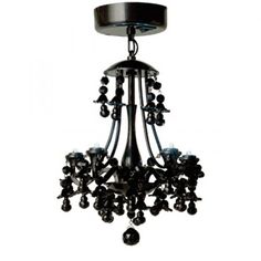 a black chandelier hanging from the ceiling