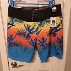 In Excellent Condition Yellow Summer Swim Trunks With Built-in Shorts, Tropical Multicolor Bottoms With Built-in Shorts, Yellow Swim Trunks With Built-in Shorts For Beach Season, Yellow Swim Trunks For The Beach, Yellow Swim Trunks For Beach, Yellow Short Swim Trunks For Beach Season, Yellow Short Swim Trunks For Beach, Yellow Swim Trunks With Built-in Shorts, Yellow Swim Trunks With Built-in Shorts For Summer