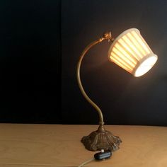 a lamp that is on top of a table