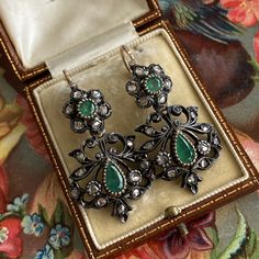 "Details: Vintage Day and Night Earrings with natural emeralds and rose cut diamonds date from the 1920's! Originally termed as \"Day and Night earrings\" because during the day they were worn as the smaller upper part of the earrings only. At night, the wearer would add on the larger dangle and be ready for an evening gala event. Today, the complete earring could be worn day or night. Made with 14 karat gold backs and 800 or better silver fronts with natural emeralds and rose cut diamonds. The Elegant Green Earrings With Rose Cut Diamonds, 18k Gold Engagement Ring, Emerald Diamond Earrings, Evening Gala, Gala Event, Cameo Earrings, Silver Heart Earrings, Gala Events, Moonstone Earrings