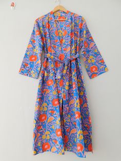 A stunning Block Printed cotton robes at an affordable price. Perfect as a Bridesmaid Robes. Treat yourself to luxurious comfort whether you're winding down for bed, getting ready for the day or simply relaxing by cozying up in this robe. Made from our incredibly soft and lightweight cotton that's perfect for any season of the year, A colorful floral pattern creates a dreamy look in pastel hues that help you relax and unwind, while the cotton tie accent at the waist makes it easy for you to wear Cotton Dressing Gown, Kimono Floral, Printed Kimono, Kimono Robes, Printed Robe, Floral Robes, Cotton Kimono, Print Kimonos, Long Kimono