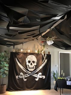 there is a pirate flag hanging from the ceiling