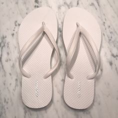 Old Navy White Flip Flops - Never Worn!!! Perfect Condition White Synthetic Flat Flip Flops, White Slip-on Summer Flip Flops, White T-strap Flip Flops, Outdoor White Non-slip Flip Flops, White Non-slip Flip Flops For The Beach, Old Navy Flip Flops, Cute Flip Flops, White Flip Flops, Navy Shoes