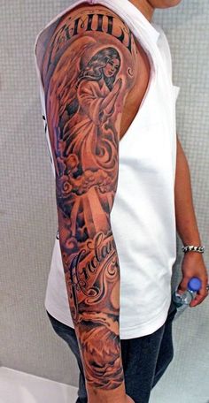 a man with a tattoo on his arm