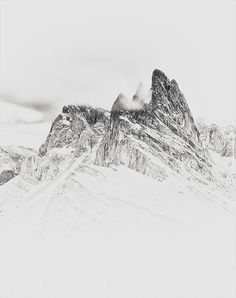 a black and white photo with the words six of crows on top of a mountain