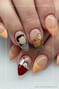 charlie brown nails thanksgiving nails Charlie Brown Nail Art, Snoopy Fall Nail Art, Snoopy Nails Simple, The Great Pumpkin Charlie Brown Nails, Snoopy Nails Thanksgiving, Great Pumpkin Charlie Brown Nails, Snoopy Nails Fall, Charlie Brown Thanksgiving Nails, Snoopy Thanksgiving Nails