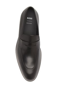 Rich calfskin leather elevates an Italian-crafted penny loafer that will make the perfect addition to your everyday office wardrobe. Leather upper and lining/leather, rubber and synthetic sole   Made in Italy   Hugo Boss/BOSS/HUGO has received the Fair Labor Association accreditation, which signifies that the company has effective systems and procedures in place to successfully uphold fair labor standards throughout its supply chains, including strategies and tools to address and improve working Modern Calf Leather Loafers For Business, Modern Leather Loafers For Business Casual, Office Wingtip Moccasins With Branded Insole, Business Wingtip Loafers With Removable Insole, Business Wingtip Loafers With Rubber Heel Cap, Modern Calf Leather Moccasins For Business, Masculine Calf Leather Loafers For Business, Masculine Loafers With Rubber Sole For Office, Modern Goodyear Welted Loafers For Work