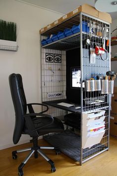 an office chair sitting in front of a computer desk