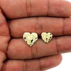 "Product Description: Brand New 10K Solid Yellow Gold Diamond Cut Heart Nugget Stud Earrings - 2 Sizes Approximate Weight - Height - Width Small - Weight: 1.7 Grams - Length: 0.45\"(11mm) Width: 0.45(11mm) Medium - Weight: 2.1 Grams - Length: 0.60\"(15mm) Width: 0.60(15mm) Metal: Real, Genuine 10K Yellow Gold ( Not Plated) Metal Purity: Stamped 10K Design: Diamond-Cut Heart Nugget Stud Earrings Material: 10K Genuine Gold Metal Stamp: 10K Country of Manufacture: Italy It comes in a Beautiful Free Gift Box These Earrings are 100% Authentic 10K Gold \"Not Plated or Filled\" This is a Beautiful Genuine 10K Solid Yellow Gold Nugget Stud Earrings will look Great on Men & Women. SHIPPING & RETURN POLICY FREE SHIPPING IN THE USA We Offer 30 Days Refund & Exchange Policy To view our entire collecti 14k Gold Diamond Cut Heart Earrings, Gold Heart Earrings Diamond Cut Gift, 14k Gold Heart-shaped Diamond Cut Earrings, 14k Gold Heart Earrings With Diamond Cut, Valentine's Day Yellow Gold Heart Earrings With Diamond Cut, 14k Gold Tarnish Resistant Heart Earrings For Valentine's Day, 14k Gold Diamond Cut Heart Earrings For Anniversary, Valentine's Day 14k Gold Tarnish Resistant Heart Earrings, Valentine's Day 14k Gold Tarnish-resistant Heart Earrings