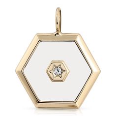 Ashley Pendant is brass plated 10K Gold. Center of pendant is filled with white enamel and center stone is a Swarovski crystal Ashley charm is a polygon shaped pendant Charm measures 1.25" long x 1.58" wide Made in the USA Ashley White, Hypoallergenic Jewelry, Demi Fine Jewelry, Vermeil Jewelry, Solid Gold Jewelry, Hexagon Shape, Gift Accessories, White Enamel, Jewelry Pouch