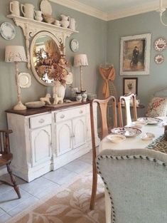 the dining room is decorated with antique china