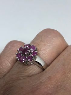 Unusual  Deep Toned Ruby finished 925 Sterling Filigree Setting Handmade  size 6.5 Can be resized. My jeweler charged $10-$20 All rings are shipped in a nice gift box.   Check out our over a THOUSAND great reviews Engraving is $4 per letter and is not always perfect depending on the piece. It can take a few days if the jeweler is busy. This is payable to Paypal Judithsltd@gmail.com Classic Silver Ruby Ring For Valentine's Day, Silver Ruby Ring For Valentine's Day, Birthstone Cluster Ring Gift, Ruby Cluster Ring Gift, Silver Ruby Cluster Ring For Formal Occasions, Gift Ruby Cluster Ring, Purple Ruby Rings As Gifts, Purple Ruby Rings For Gifts, Purple Ruby Ring For Gift