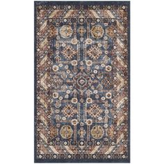 a blue rug with an intricate design on the front and back side, in various colors