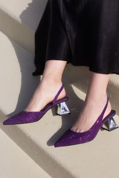 Featuring dazzling embellishments and sleek designs, our heels are the perfect choice for making a statement at any special occasion. Shop Kat Maconie collection now and steal the spotlight!

featuring ANANI by Kat Maconie , stunning blackcurrant purple slingback pump with all-over crystal embellishment and statement silver heel.

#womensheels #highheels #pumpheels #pumps #partyshoes #highheelpumps #partyheels #chicheels #silverpumps #silvershoes #metallicshoes #metallicheels Silver Heel, Shoe Trends, Silver Pumps, Velvet Heels