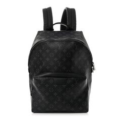 This authentic LOUIS VUITTON Monogram Eclipse Discovery Backpack PM.  This chic backpack is crafted from monogram eclipse coated canvas. It features adjustable shoulder straps, a reinforced top handle, a front zipper pocket with, and dark silver hardware. The main zipper opens to a black fabric interior with patch pockets. Chic Backpack, Designer Backpack, Louis Vuitton Backpack, Designer Backpacks, Authentic Louis Vuitton, Silver Hardware, Black Fabric, Front Zipper, Louis Vuitton Monogram