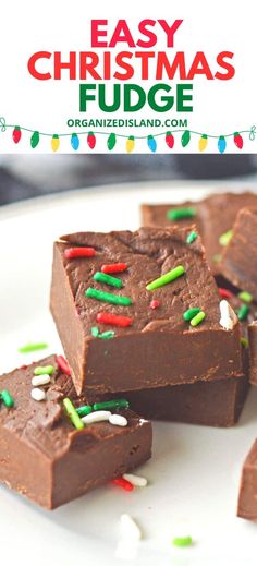 easy christmas fudge brownies with sprinkles on a white plate