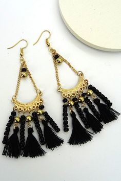 Ready for the club, the tropics, or even the beach/pool parties. We will not let you down with these cute bohemian fun earrings. Size+Fitlength: 4"Width: 1" Casual Black Jewelry For Vacation, Trendy Black Jewelry For Vacation, Black Drop Earrings For Summer, Black Dangle Earrings For Summer, Black Dangle Jewelry For Summer, Casual Black Jewelry For The Beach, Casual Black Beach Jewelry, Black Dangling Beads Jewelry For Beach, Summer Festival Jewelry With Black Beads