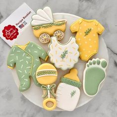 baby shower cookies on a white plate