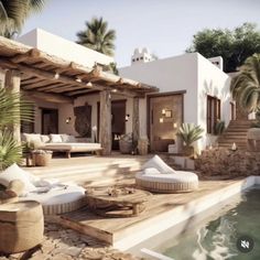 an outdoor pool with lounge chairs and palm trees in front of the house that's built into the hillside